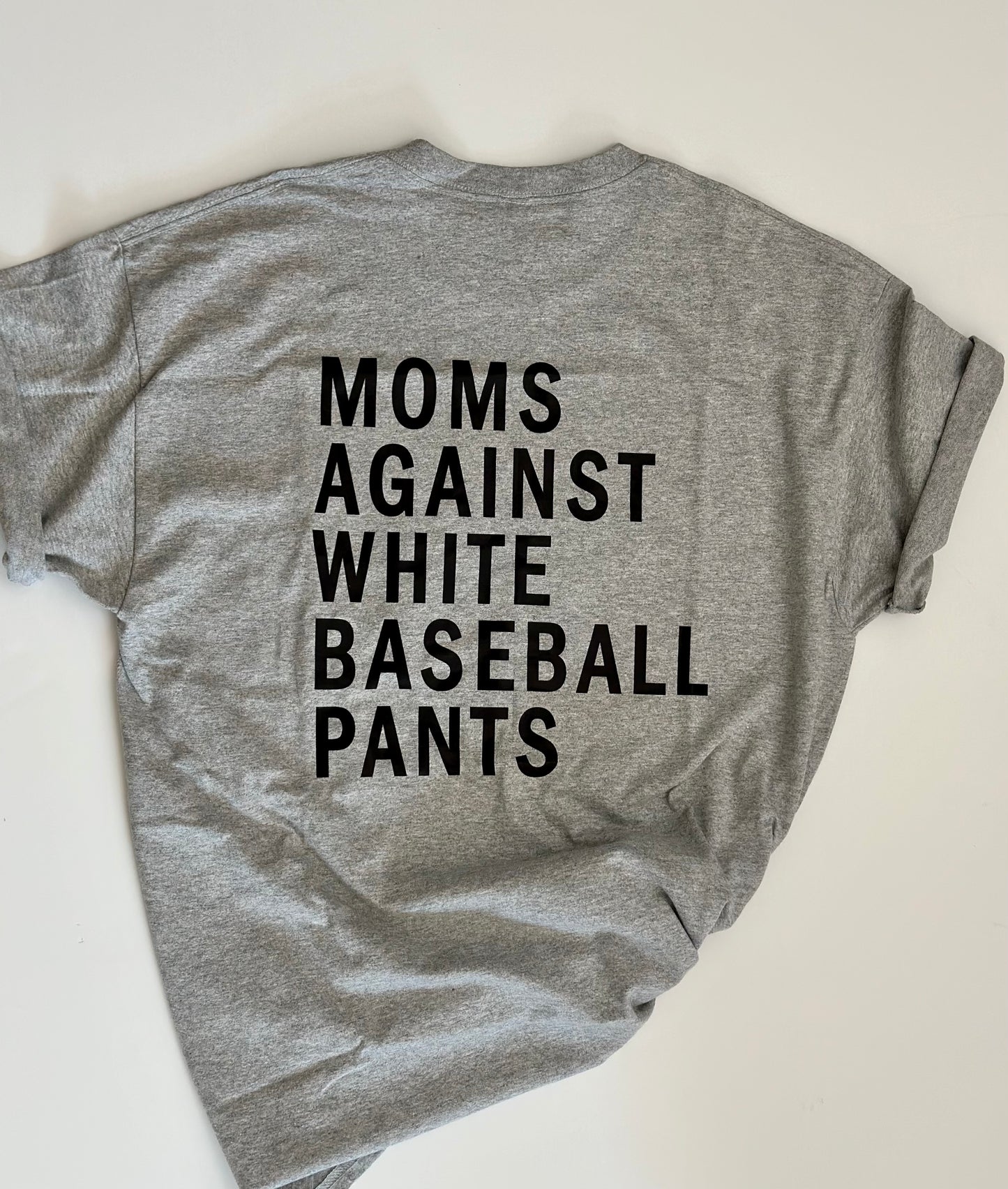 Moms Against white pants t-shirt